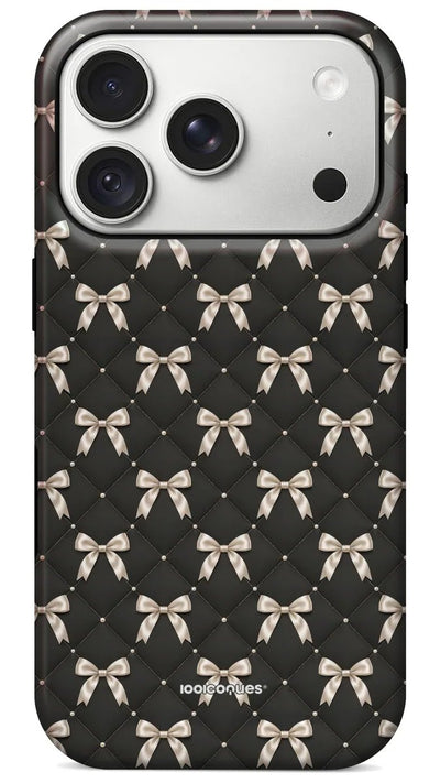 Coque Prestige Nœuds Nuit vue de dos : des nœuds crème sur un capitonnage noir