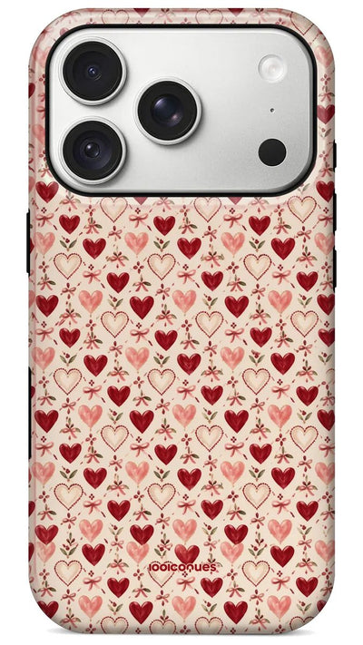 Coque Prestige Cupidon vue de dos : des cœurs rouges et roses sur fond crème